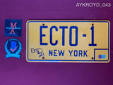 AYKROYD_043 - Ghostbusters ECTO-1 Yellow License Plate Autographed By Dan Aykroyd