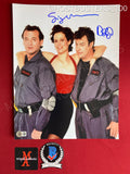 GHOSTBUSTERS_100 - 11x14 Ghostbusters Photo Autographed By Dan Aykroyd & Sigourney Weaver