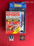 LLOYD_124 - Grays Sports Almanac Book Universal Back To The Future Prop Replica Autographed By Christopher Lloyd