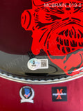 MCBRAIN_019 - Iron Maiden Evans Black Drumhead Autographed By Nicko McBrain