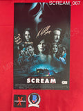 SCREAM_067 - 11x17 Photo Autographed By Neve Campbell, Mikey Madison & Jasmin Savoy Brown