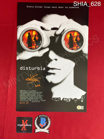 SHIA_628 - 11x17 Photo Autographed By Shia LaBeouf