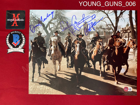 YOUNG_GUNS_006 - 11x14 Photo Autographed By Kiefer Sutherland, Charlie Sheen, Emilio Estevez & Dermot Mulroney
