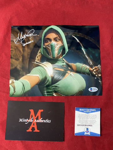 MELA_005 - 8x10 Metallic Photo Autographed By Mela Lee