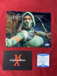 MELA_013 - 8x10 Metallic Photo Autographed By Mela Lee