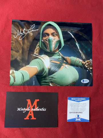 MELA_013 - 8x10 Metallic Photo Autographed By Mela Lee