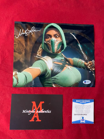 MELA_014 - 8x10 Metallic Photo Autographed By Mela Lee