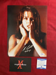 NEVE_352 - 11x14 Photo Autographed By Neve Campbell