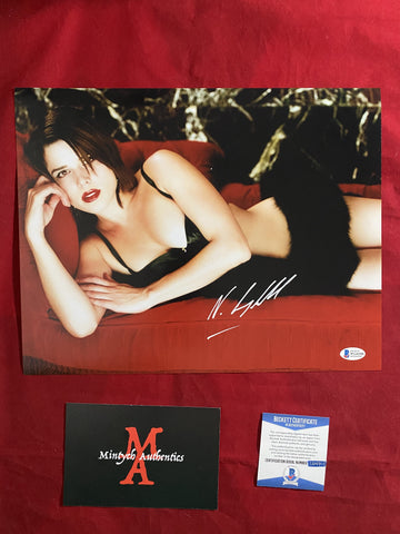 NEVE_362 - 11x14 Photo Autographed By Neve Campbell