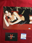NEVE_363 - 11x14 Photo Autographed By Neve Campbell