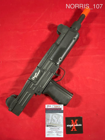 NORRIS_107 - Invasion USA Uzi Toy Gun Autographed By Chuck Norris