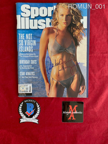 ROMIJN_001 - Sports Illustrated Winter 1999 Swimsuit Edition Magazine Autographed By Rebecca Romijn
